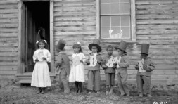 Children_at_Fort_Simpson_Indian_Residential_School_holding_letters_that_spell_“Goodbye,”_Fort_Simpson